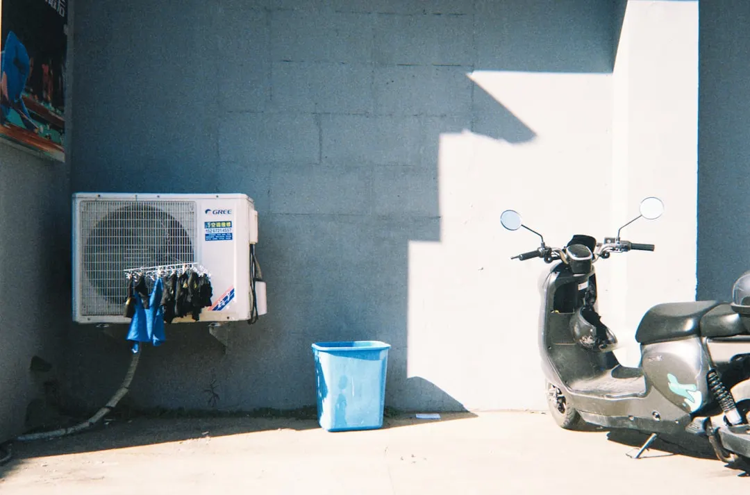 AC tune-up service on residential outdoor unit in Tampa