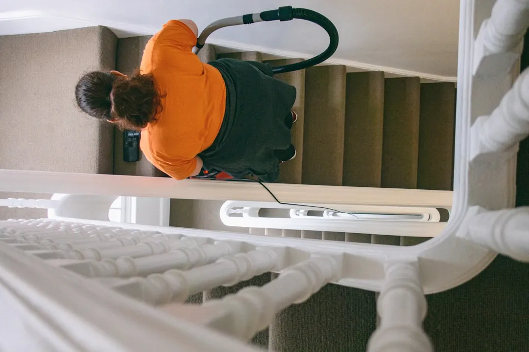 Duct cleaning technician with HEPA vacuum in Tampa