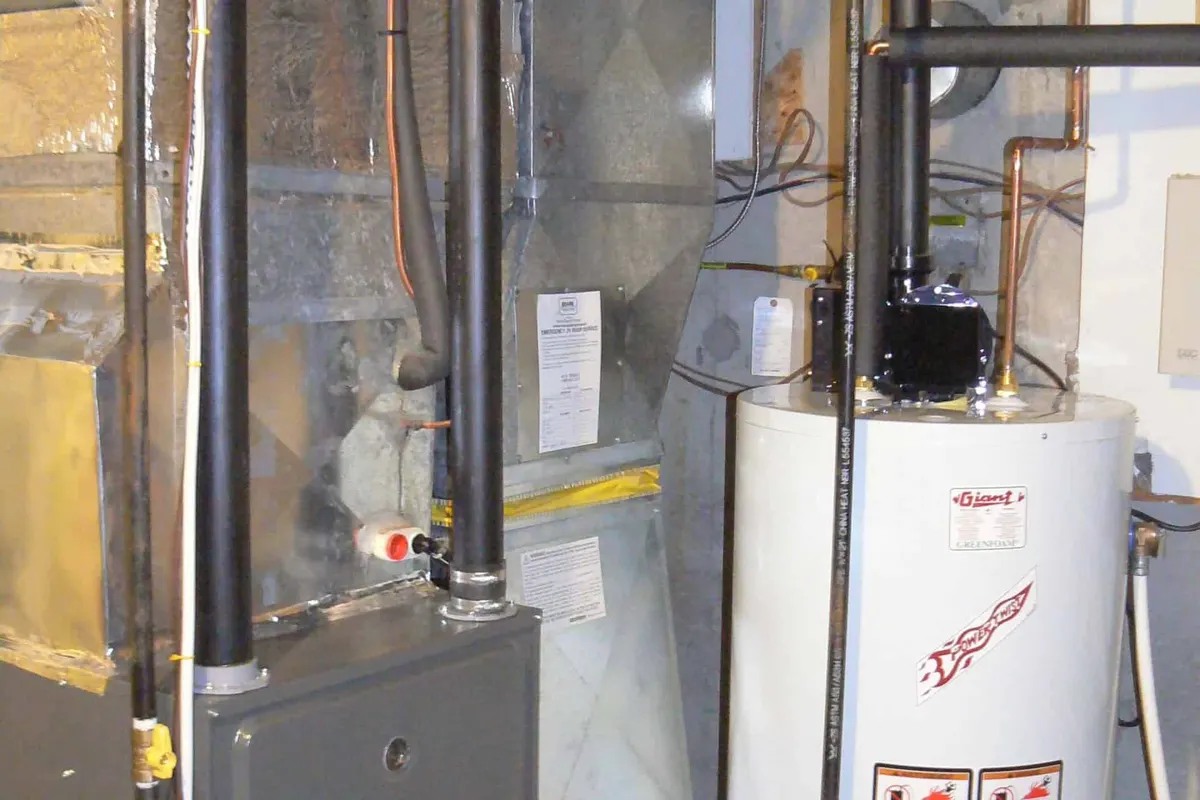 New high-efficiency gas furnace installed in a Tampa basement mechanical room