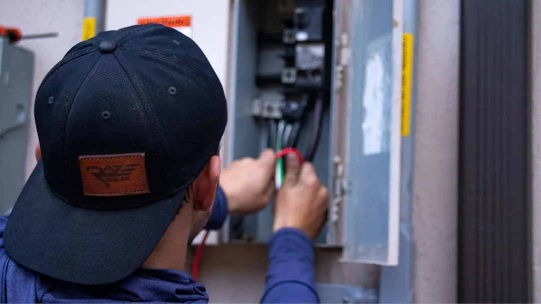 Tampa Air Conditioning technician installing a high-efficiency furnace
