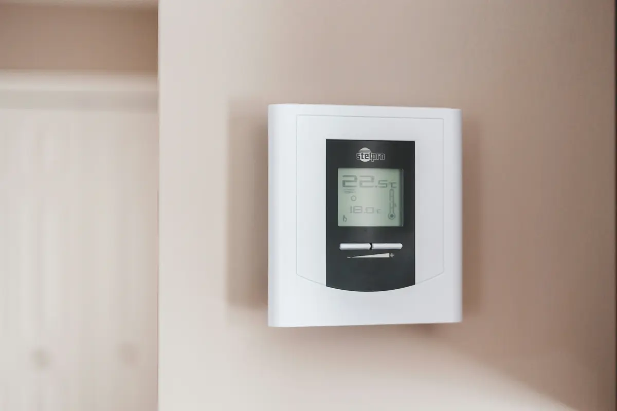 Smart thermostat installed on wall in a Tampa home